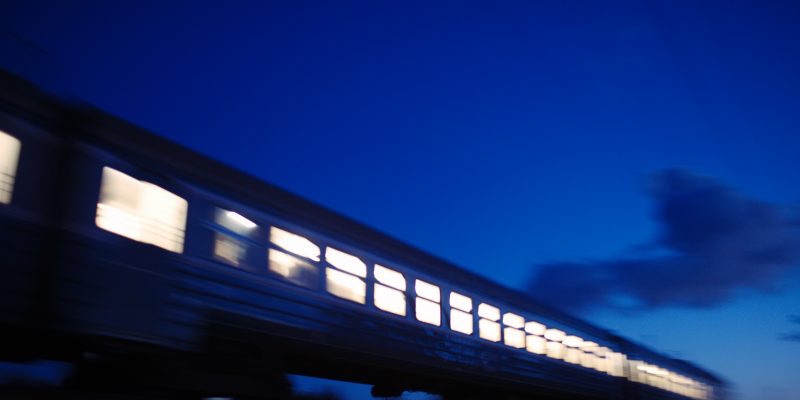 Oficinas Legales De Sharona Eslamboly train traveling past at night